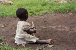 African baby in dirt